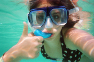 Thumbs up underwater